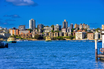 Fototapeta na wymiar Sydney CBD skyline of buildings in the harbour waters NSW Australia