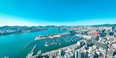 Fototapeta na wymiar Aerial view of Hong Kong city in a sunny day