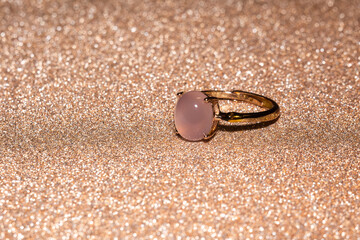 Gold ring with pink chalcedony