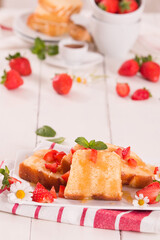 Lemon pound cake with honey and fresh strawberries.