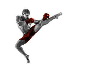 Fototapeta na wymiar Black and white athlete boxer in jump in red gloves isolated on white background. Sport concept