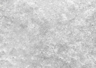 Dirty snow on nature as a background.
