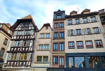 Fototapeta na wymiar View of medieval buildings at the channel at little france quarter in Strasbourg at winter