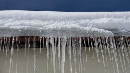 dangerous icicles hanging from roofs