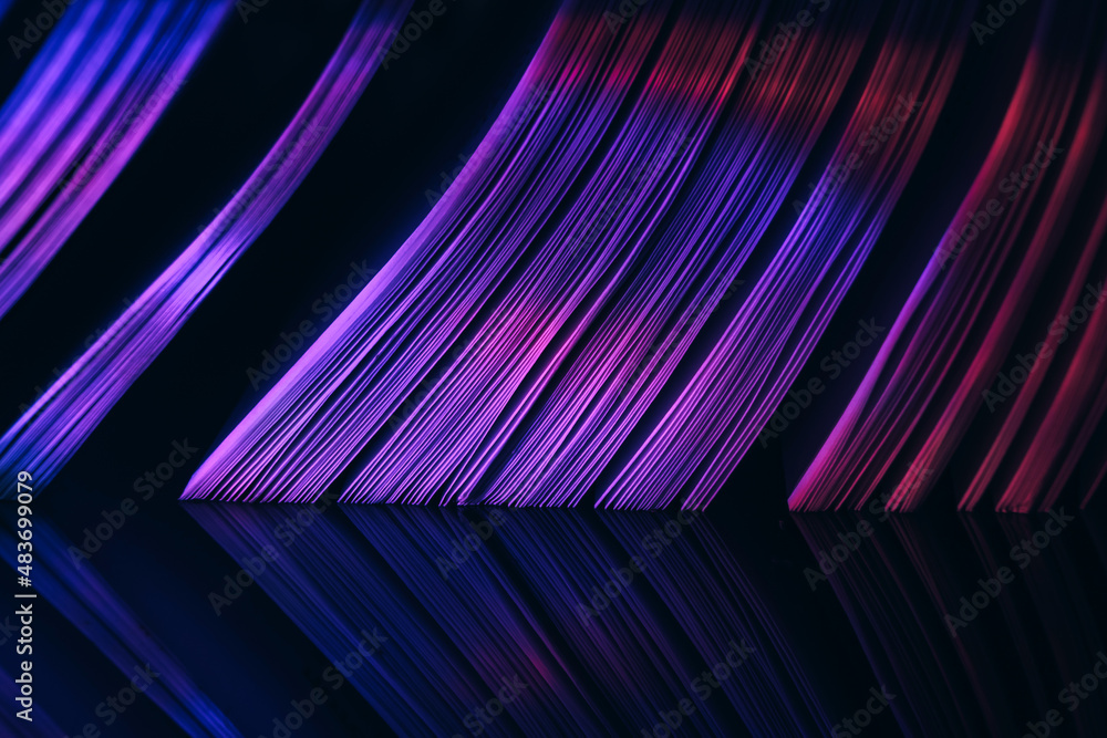 Fototapete Close up Beautiful book pages in the color light on a night. Background pattern for design. Macro photography view.