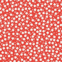 Seamless vintage pattern. Small white flowers and leaves . Red background. vector texture. fashionable print for textiles, wallpaper and packaging.