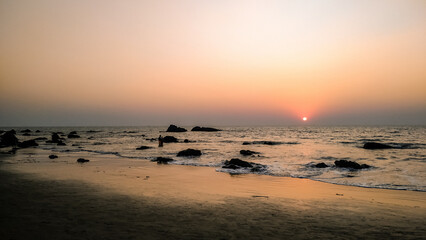 Stunning sunset at the sea in India. Arambol, GOA. - obrazy, fototapety, plakaty