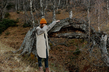 young woman in an orange hat nature autumn life style