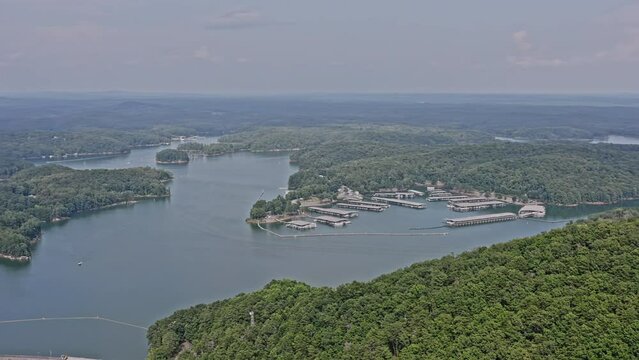 Vineyard Mountain Georgia Aerial v2 panoramic pan shot capturing the spectacular scenic view of allatoona water reservoir, hillside neighborhood and mountain hiking trails - August 2021