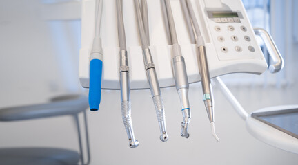 Close up of modern dentist tools, polishing machines with blurred background