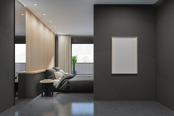 Side view on dark bedroom interior with empty white poster