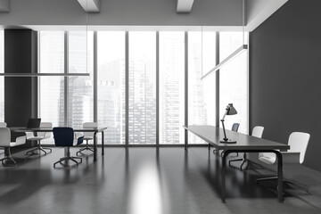 Business room interior with seats, table with lamp. Window with city view