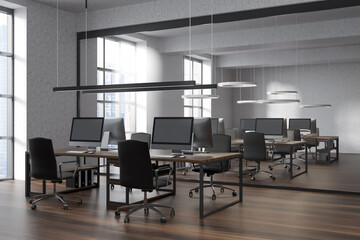 Bright office room interior with workplaces and panoramic windows