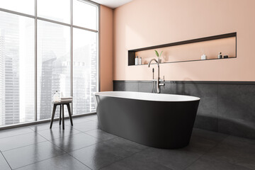 Corner view on dark bathroom interior with bathtub, panoramic window