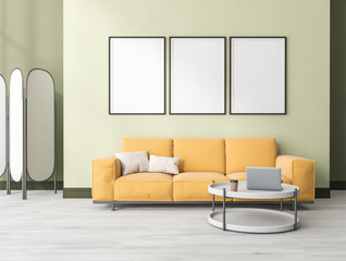 Bright living room interior with three empty white posters, sofa