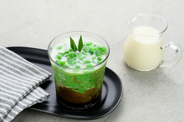 Es Cendol or Dawet is a traditional Indonesian dessert consist of cendol (made from rice flour), coconut milk and palm sugar. Popular during Ramadan.
