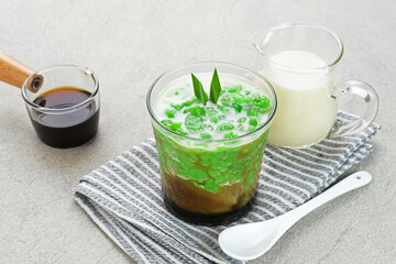 Es Cendol or Dawet is a traditional Indonesian dessert consist of cendol (made from rice flour), coconut milk and palm sugar. Popular during Ramadan.
