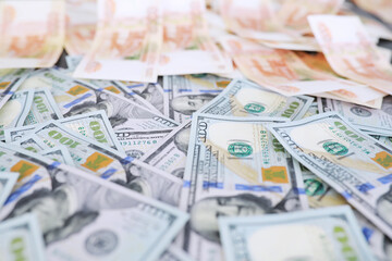 Group of money stack of 100 US dollars banknotes a lot of the background texture. Cash money in a large pile as a finance background.