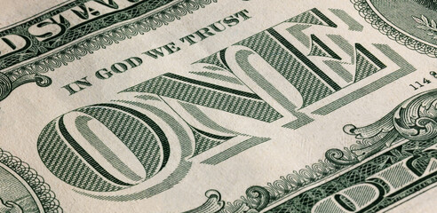 one US dollar with central inscription close up