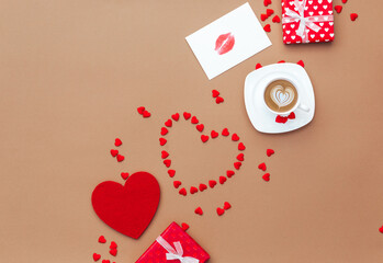 Valentines Day background. Gifts, hearts confetti, lips, sweet on pastel background. Valentines day concept. Flat lay, top view, copy space
