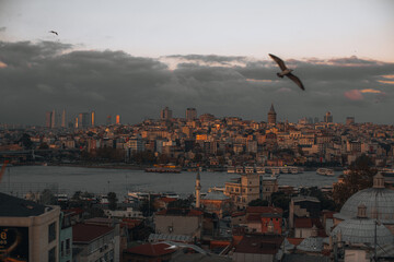 Black Sea, moody evening sky and beautiful view of Istanbul city with vintage buildings, Turkey