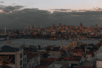 Fototapeta na wymiar Black Sea, moody evening sky and beautiful view of Istanbul city with vintage buildings, Turkey