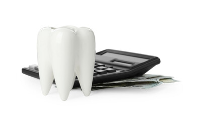 Ceramic model of tooth, calculator and dollar banknotes on white background. Expensive treatment