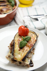 Plate of delicious eggplant lasagna on table