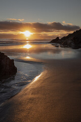 Obraz premium Freathy Beach in Whitsand Bay South East Cornwall at sunset and low water
