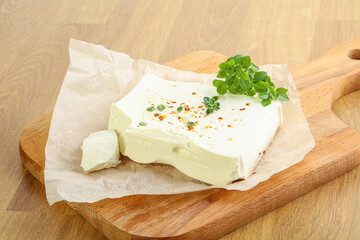 Greek Feta cheese over board