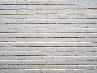 Background of a white brick wall. Grunge, dirty, weathered white bricks. Copy space
