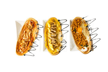 cooking rolling pancake (Khanom Tokyo) with 3 fillings in a hot pan. is a thin flat pancake filled