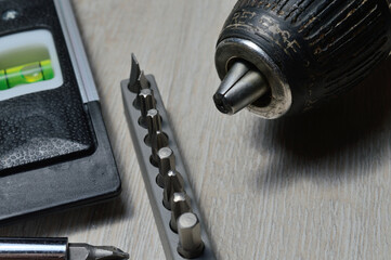 a working tool for minor repairs is laid out on the table