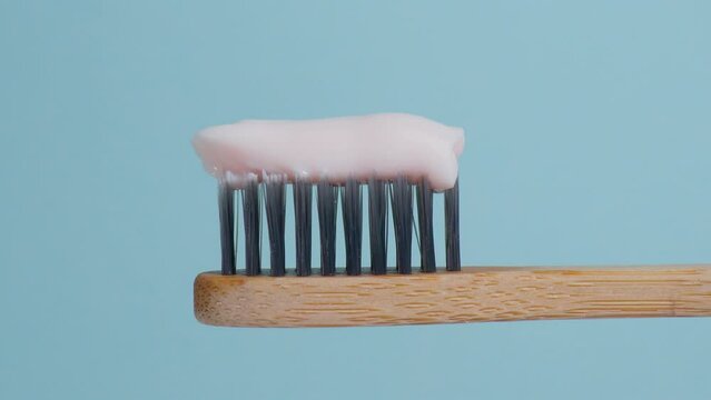 Eco friendly toothbrushes made of natural bamboo. Toothpaste close up. House with zero waste. bathroom essentials.