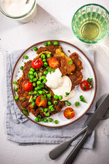 Eating healthy light brunch. Chickpea pancakes