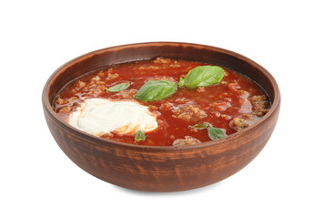 Bowl of delicious stuffed pepper soup on white background