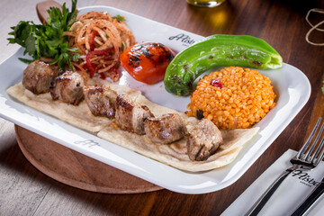traditional meat skewer with bulgur pilaf