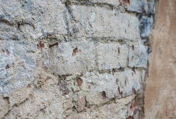 Textured brick wall surface. Angle perspective view to brick wall.