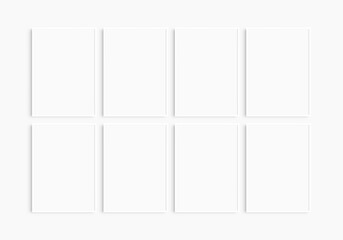 Frame mockup 5x7, 50x70, A4, A3, A2, A1. Set of eight thin light wood frames. Gallery wall mockup, set of 8 frames. Clean, modern, minimalist, bright. Portrait. Vertical.