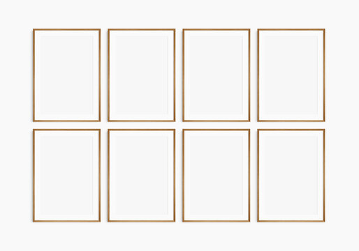 Frame mockup 5x7, 50x70, A4, A3, A2, A1. Set of eight thin cherry wood frames. Gallery wall mockup, set of 8 frames. Clean, modern, minimalist, bright. Portrait. Vertical. Mat opening 2:3.