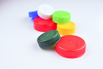 Group of multicolored bottle caps.