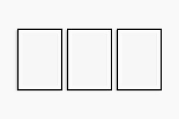 Frame mockup 5x7, 50x70, A4, A3, A2, A1. Set of three thin black frames. Gallery wall mockup, set of 3 frames. Clean, modern, minimalist, bright. Portrait. Vertical. Mat opening 2:3.