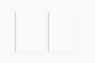 Frame mockup 5x7, 50x70, A4, A3, A2, A1. Set of two thin white frames. Gallery wall mockup, set of 2 frames. Clean, modern, minimalist, bright. Portrait. Vertical.