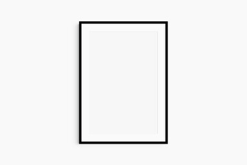 Frame mockup 5x7, 50x70, A4, A3, A2, A1. Single black frame mockup. Clean, modern, minimalist, bright. Portrait. Vertical. Passepartout/mat opening in 2:3 aspect ratio.