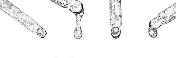 A banner with several pipettes with serum or other cosmetic product.
