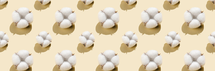 Cotton pattern on a light beige background.