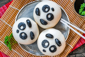 Steamed panda buns with savoury mushroom and hoisin filling. Chinese New Year celebrations