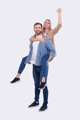 Fototapeta premium Girl Riding Man Back. Man Holding Girl. Couple Isolated. Girl on Man Back Sitting Hand Up. Love