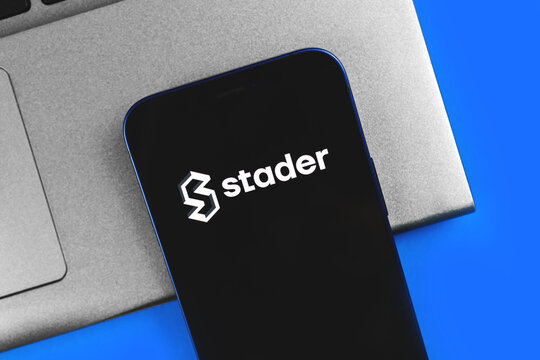 Stader token logo, new crypto currency, digital money and virtual trade business concept photo