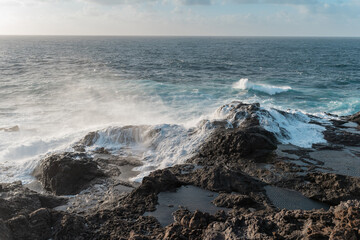 waves beating against the rocks on the coast of Galdar. Gran Canaria. Canary Islands